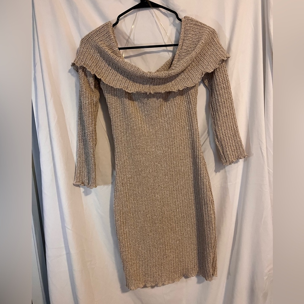 Form fitting long sleeve over the shoulder dress